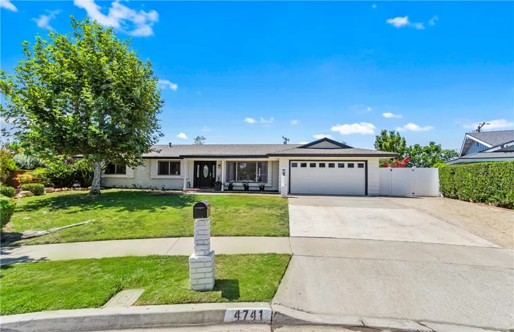 Pristine, traditional, single level home sits on a huge 17,608 Sq.Ft. elevated lot with panoramic sunset views.