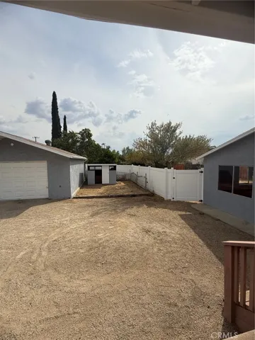 Back yard looking at garage