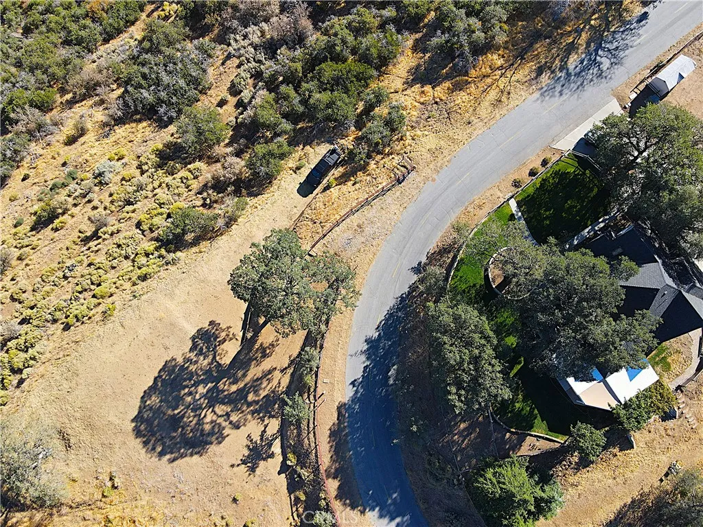 There is General Contractor building a custom home lower on Zurich Drive who would love to go crazy with this hilltop build!