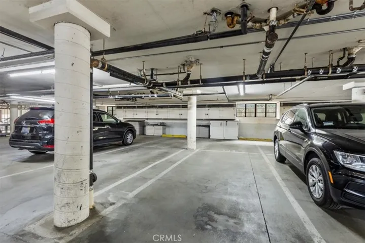 2 tandem parking spots with storage