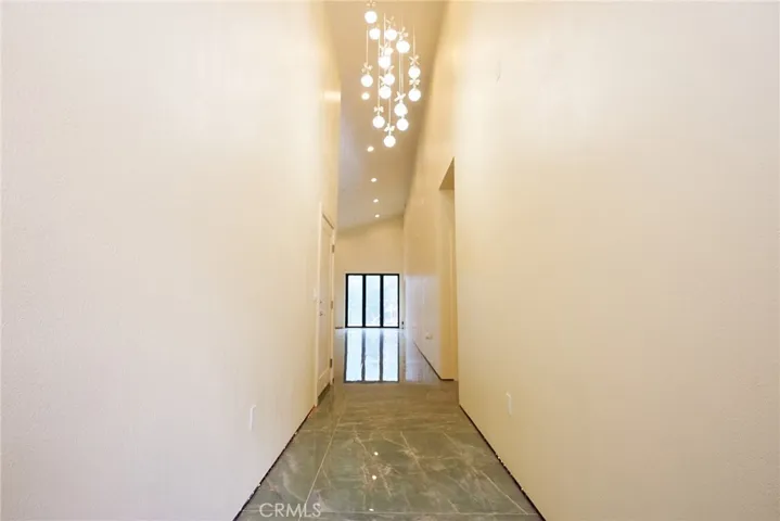 Entry hallway w/ custom entry lamp