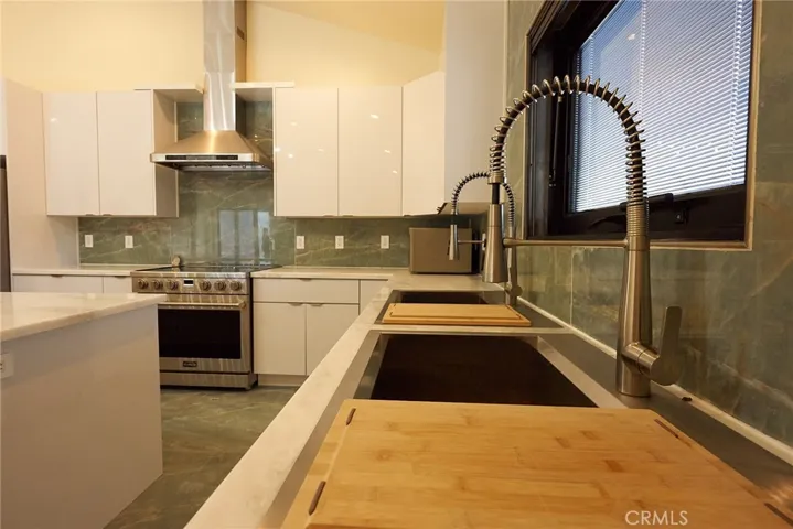 Twin sinks w/ custom matching backsplash