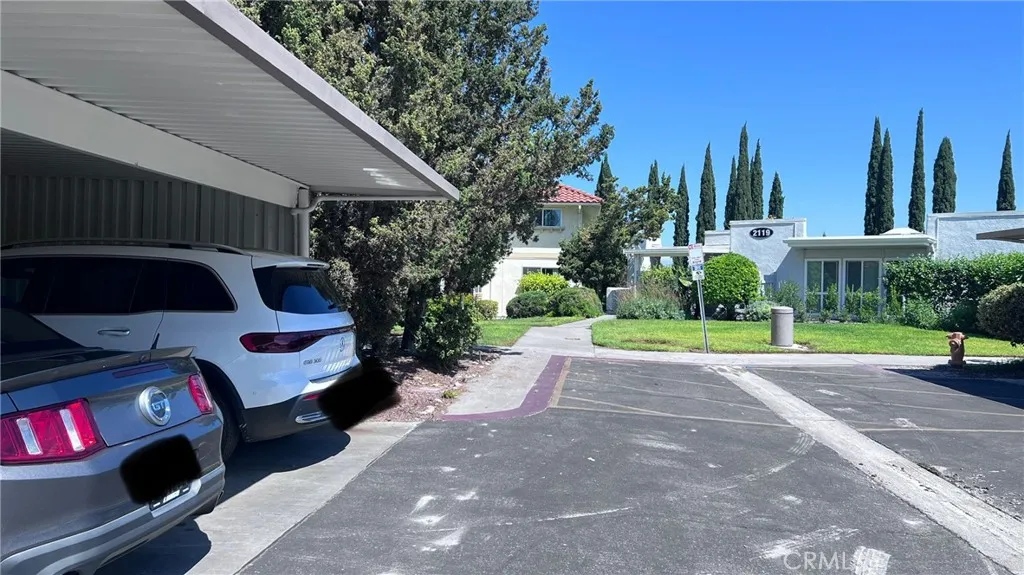Carport is #7, where the Mustang parked. From Mustang look left see entryway to home
