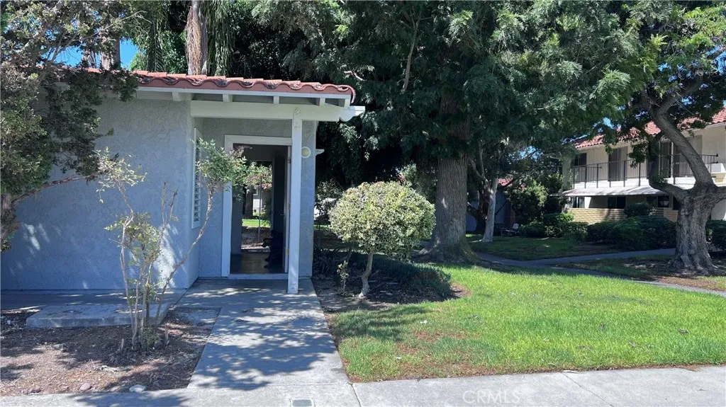 Laundry room is next to carport.