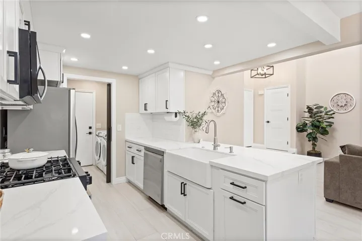 Barn door open to laundry room.