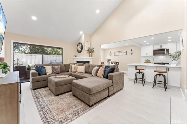 Spacious living room with cathedral ceilings.