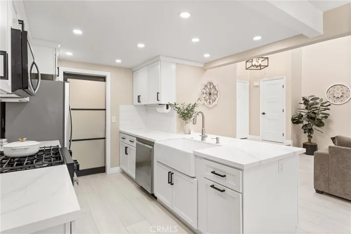 Barn door to interior laundry room.