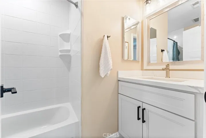 Private Remodeled Bathroom for secondary bedroom with tub/shower.