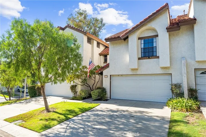 Attached two car garage with full sized driveway.