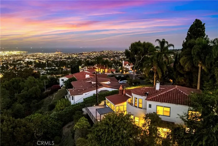 Set above Siena Canyon with expansive city, harbor and coastline views, the home is surrounded by the natural setting of the Palos Verdes Peninsula, scenic landscape, and gorgeous coastline to Orange County.