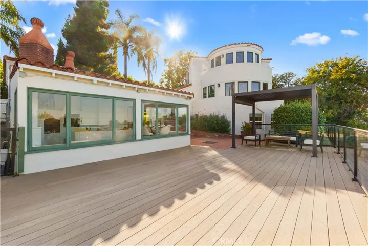 The view of 6401 Corsini Pl from the deck looking into the 320 sq.ft. studio.