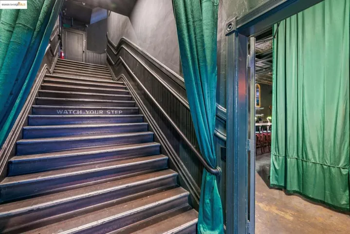 Stairway with unfinished concrete floors