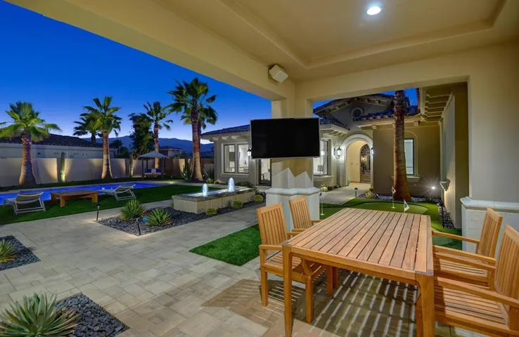 NIGHT FRONT PATIO TABLE.jpg mls