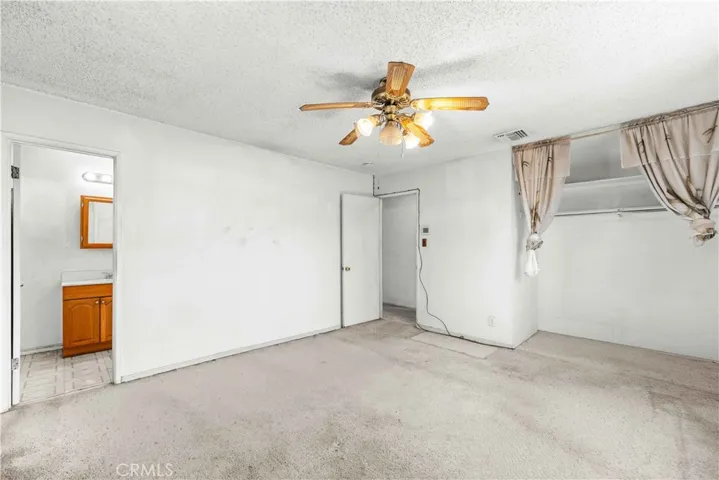 PRIMARY BEDROOM WITH PRIVATE BATH