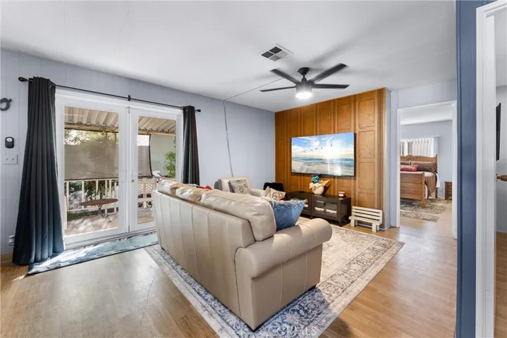 Family room conveniently located off kitchen area with access to your patio.