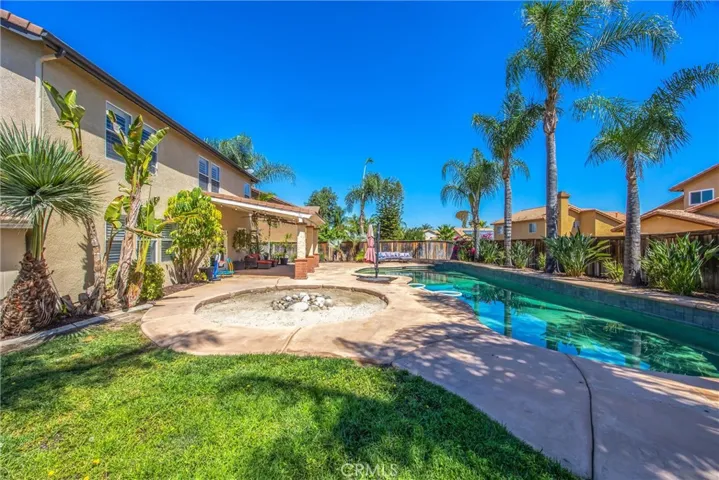 Rear lawn and sand fire pit
