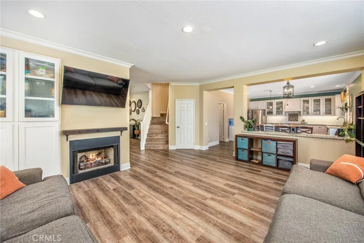 Family room with gas fireplace and custom built-in cabinets