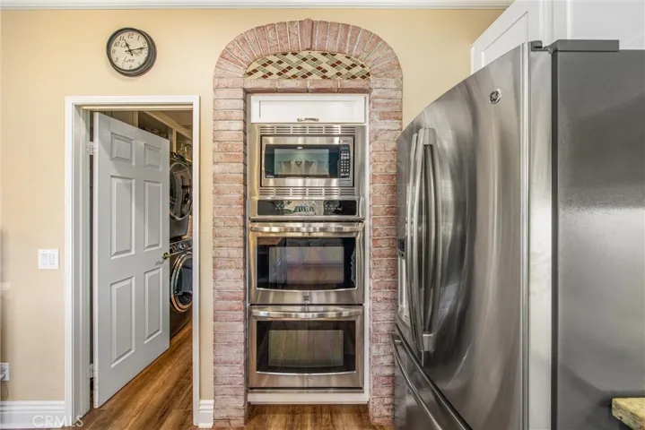 Close-up of double ovens and built-in microwave