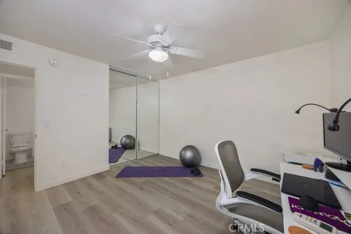 Secondary Bedroom looking back with Mirrored Doors