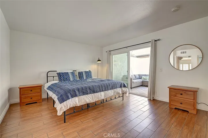 Downstairs primary bedroom has a slider to the private back patio.