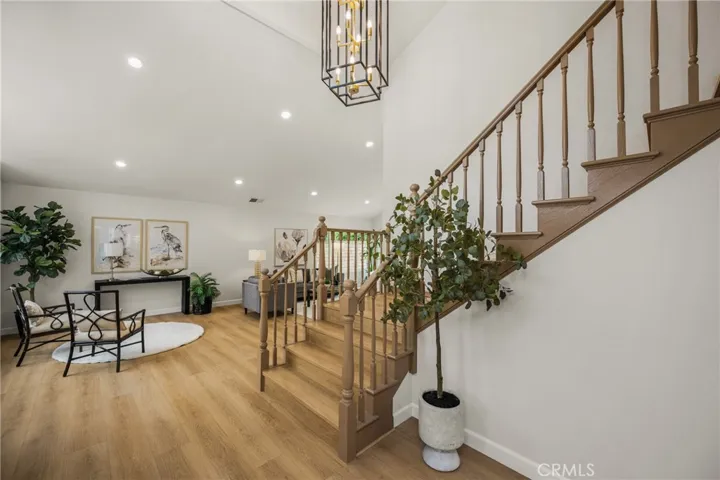 As you walk in enjoy the high ceiling and plenty of outdoor lighting