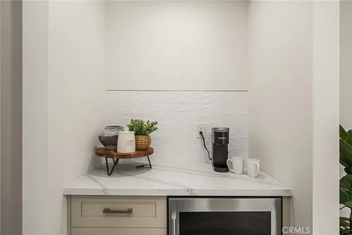 Coffee bar and wine fridge.