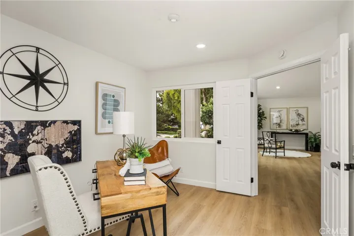 Downstairs bedroom with double doors.  Currently staged as an office.