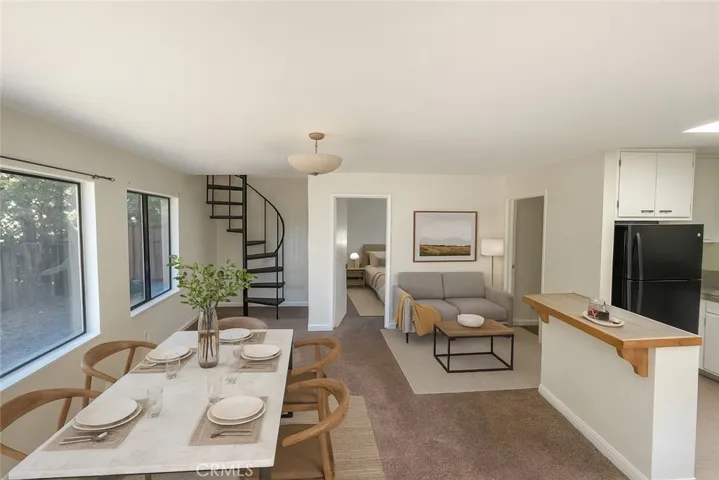 virtually staged kitchen/dining area