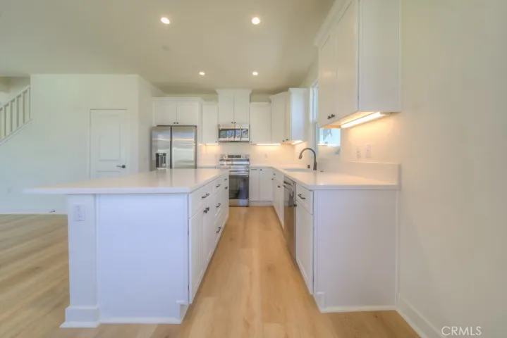 Real wood soft-close cabinetry in Kitchen and throughout.