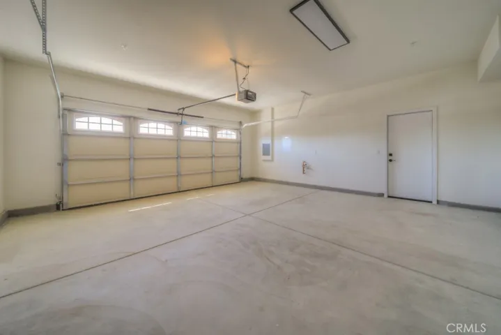 Pre-wired for EV charger in the 2 car garage.