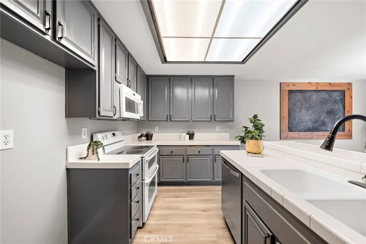 Light and Bright Kitchen Open to Dining Room