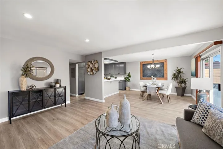 Spacious Living Room is Open to a Full-Size Dining Room with Dual Pane Sider Leading to Large Patio