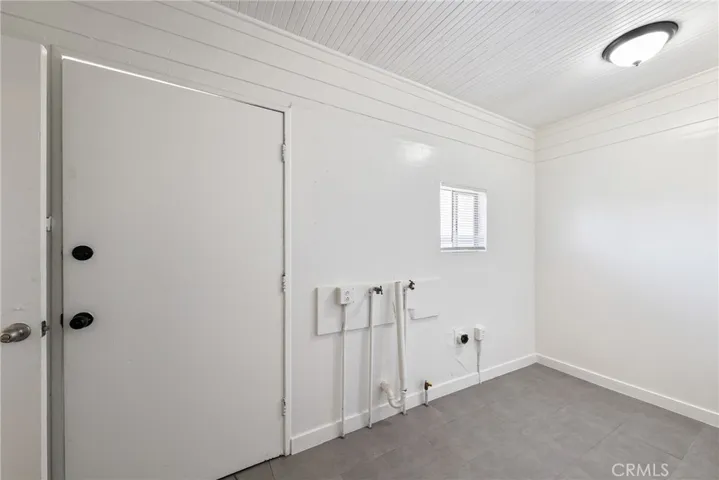 15329 Paramount Blvd: Home / Laundry Room