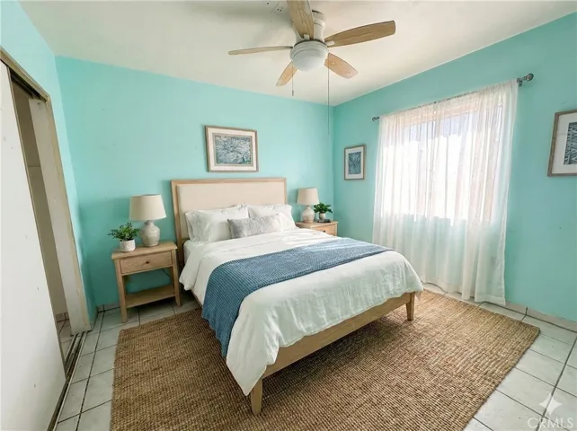 Front vacant unit, bedroom #2 virtually staged
