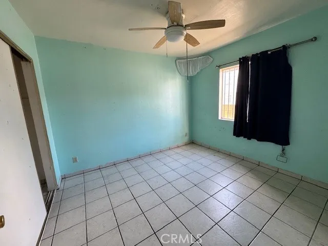 Front vacant unit bedroom, unstaged