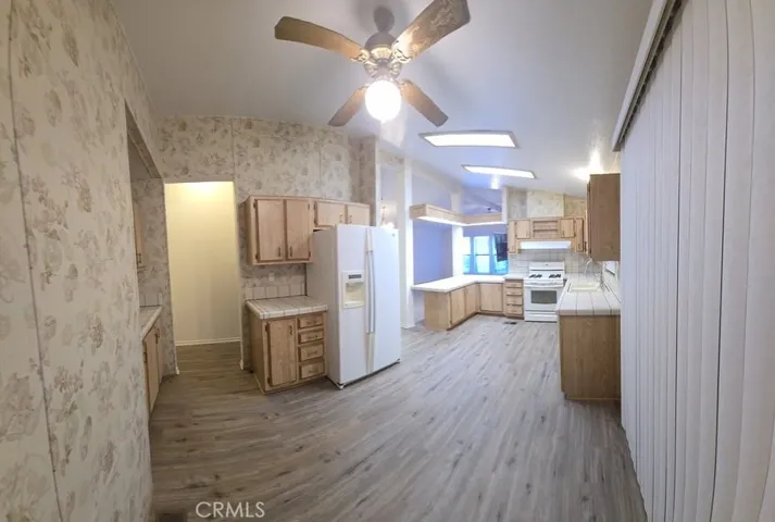 from eating area in kitchen towards rest of kitchen
