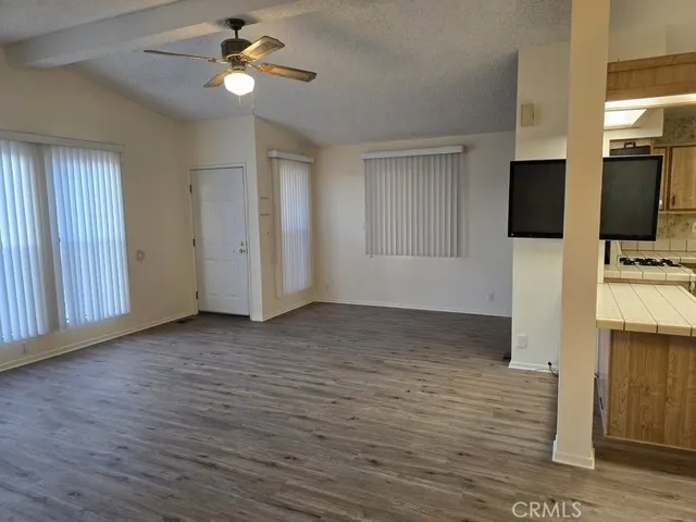 dining area towards living room and kitchen breakfast counter