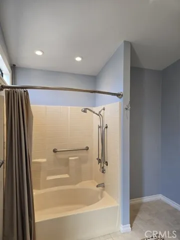 shower over tub, handicap bars in master bath