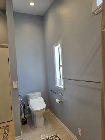 master bath toilet Bidet area, handicap bars