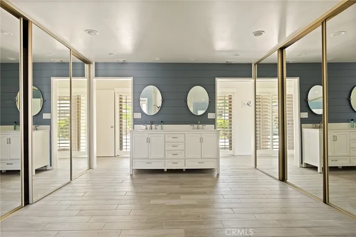 Master dressing area.  Closets have built in cabinets.