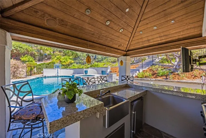 Pool cabana with kitchen