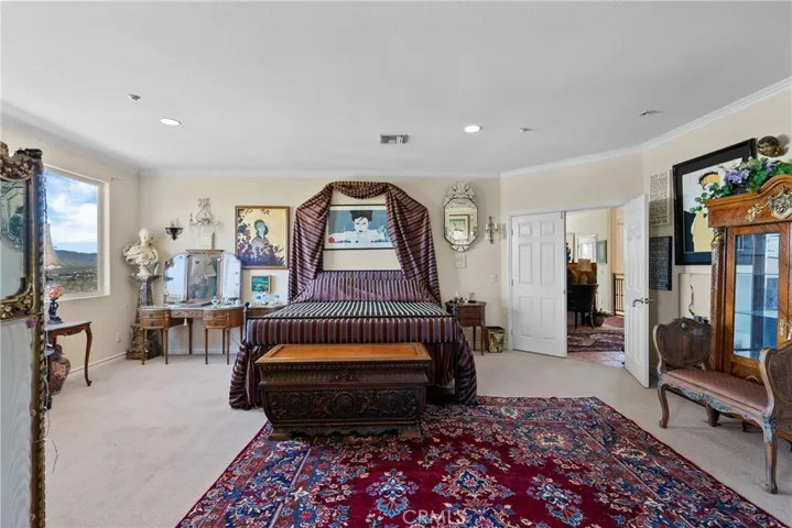 Large Primary Bedroom with Views, Balcony and double entry doors