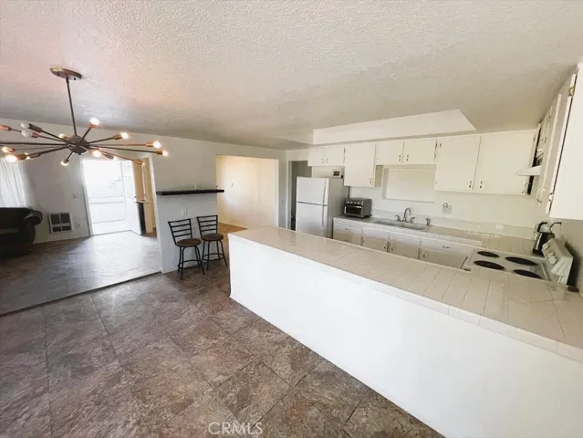 Larger Unit Kitchen and Dining Room