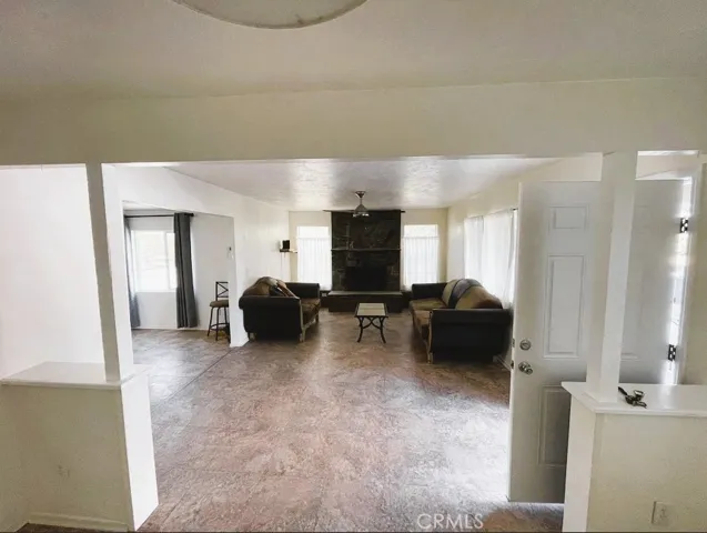 Larger Unit Living Room with Fire Place