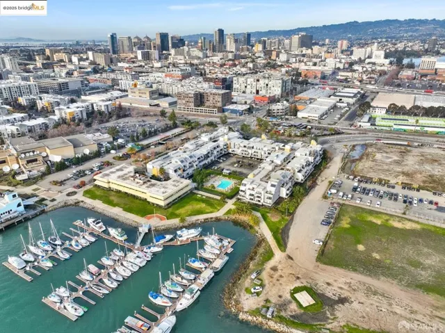 Aerial overview of property's location with nearby urban area