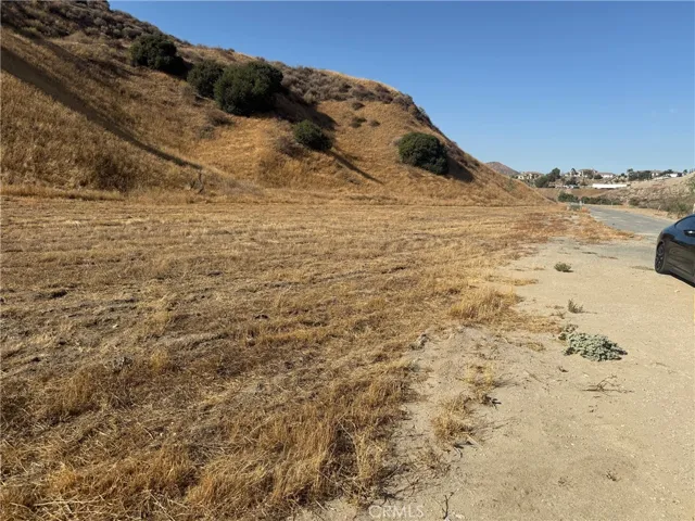 This is another flat area next to the house at the end of the street.