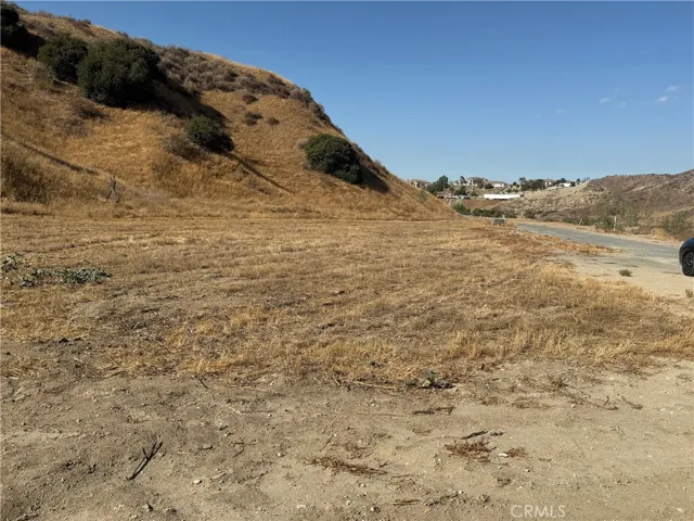 This is another flat area next to the house at the end of the street.