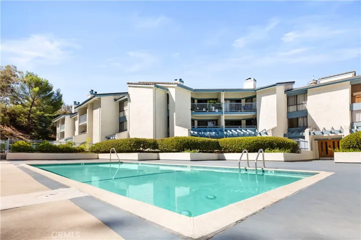 Community Pool with Building View