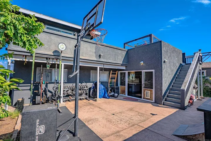 Walk up these back stairs to the awesome deck!
