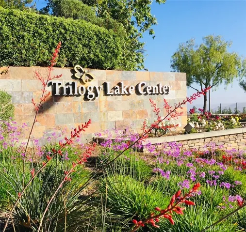 Landmark Trilogy Sign Leads To Lake Center Offices, Sports Center & Trilogy Lodge